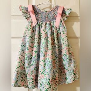 Floral smocked girls’ (toddler) dress, pink ribbon accents! Like new.